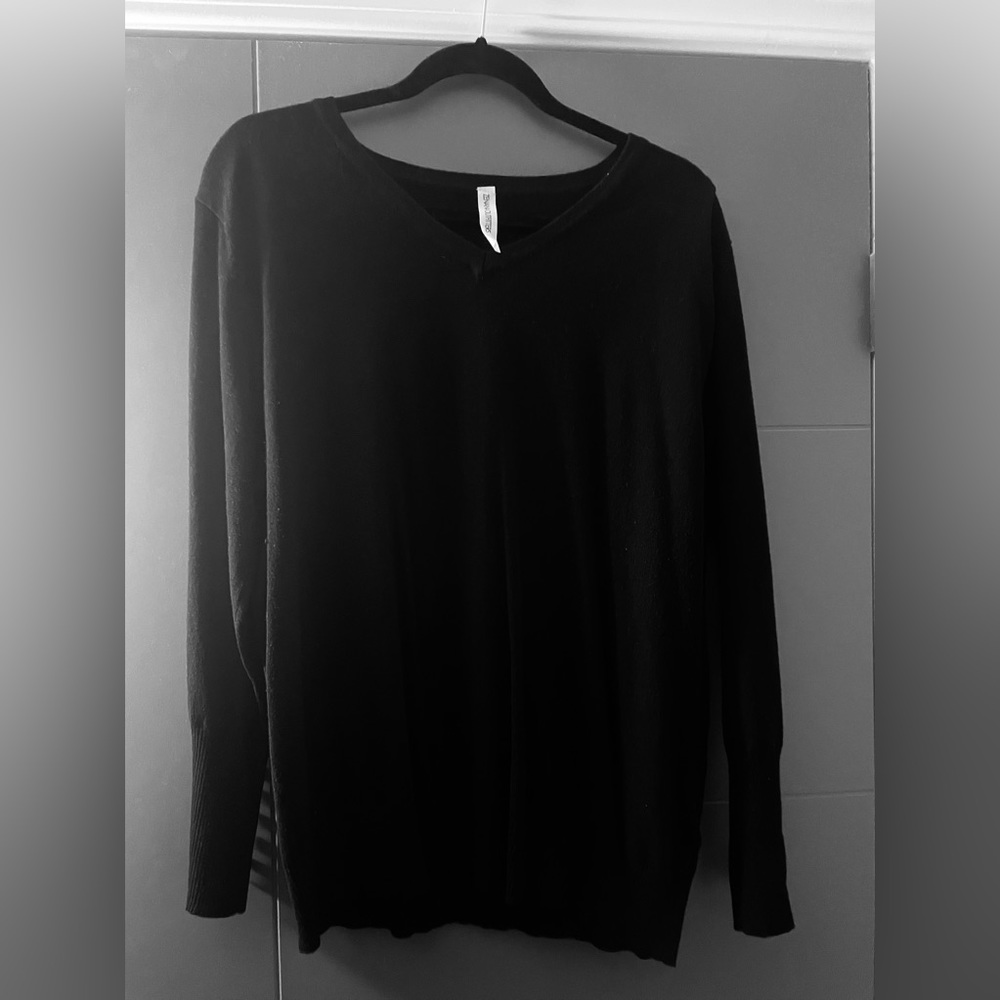 Lightweight black sweater.